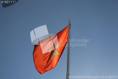 Image of National flag of Morocco on a flagpole