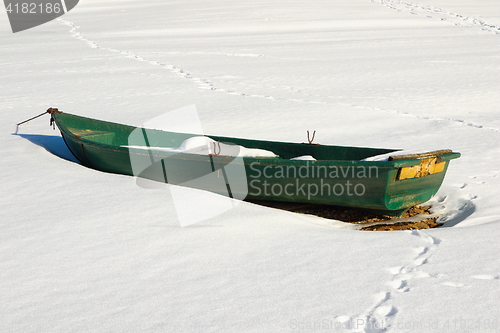 Image of green abandoned boat