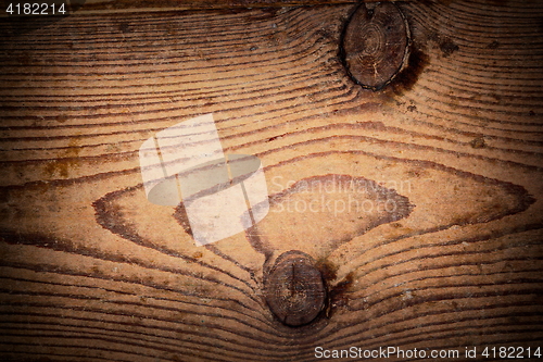 Image of texture of knotted fir plank