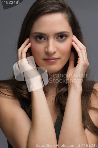 Image of portrait  of beautiful young brunette woman