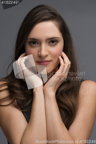 Image of portrait  of beautiful young brunette woman