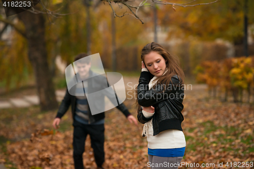 Image of Happy young Couple in Autumn Park