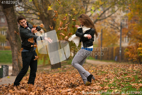 Image of Happy young Couple in Autumn Park