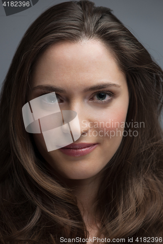 Image of portrait  of beautiful young brunette woman