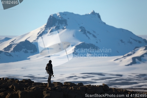 Image of Standing on a cliff