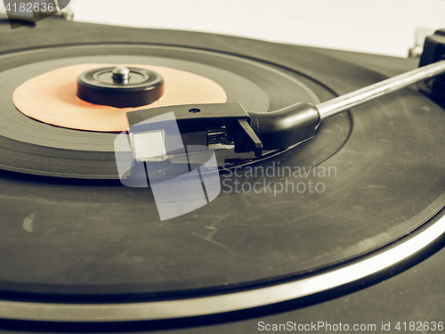 Image of Vintage looking Vinyl record on turntable