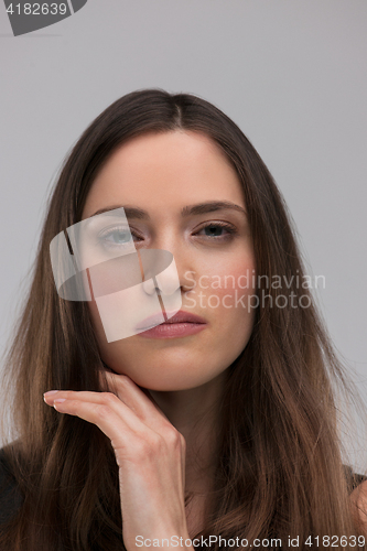 Image of portrait  of beautiful young brunette woman