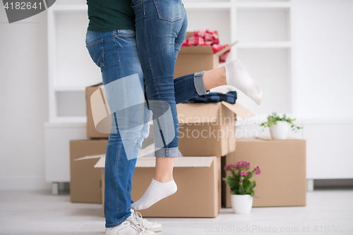 Image of happy Young couple moving in new house