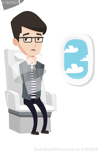 Image of Young man suffering from fear of flying.