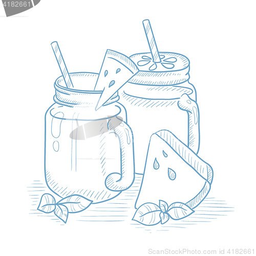 Image of Watermelon smoothie in mason jar.