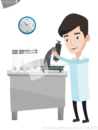 Image of Laboratory assistant with microscope.
