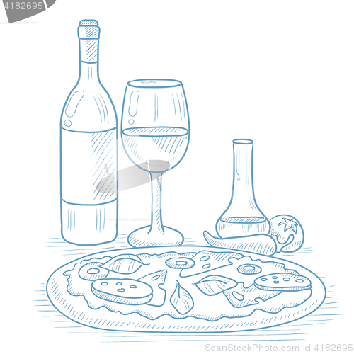 Image of Dinner with wine and pizza.