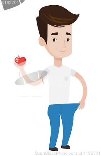 Image of Slim man in pants showing the results of his diet.