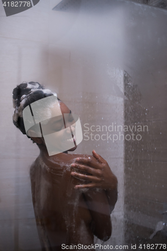 Image of African American woman in the shower