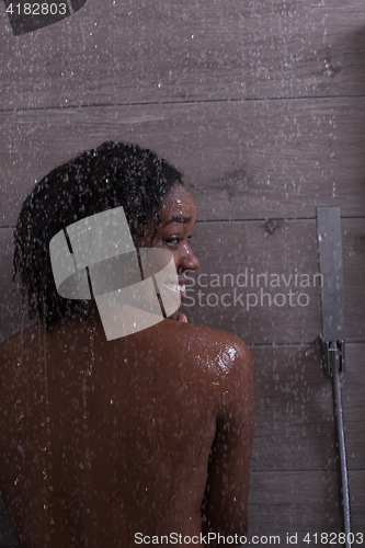 Image of African American woman in the shower