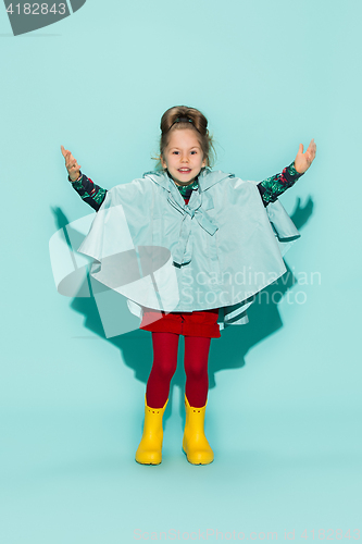 Image of Little girl posing in fashion style wearing autumn clothing.