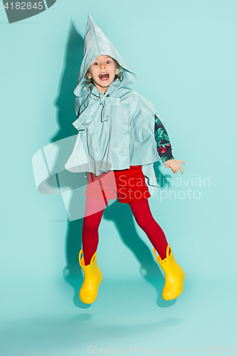 Image of Little girl posing in fashion style wearing autumn clothing.