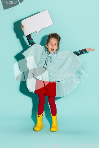 Image of Little girl posing in fashion style wearing autumn clothing.