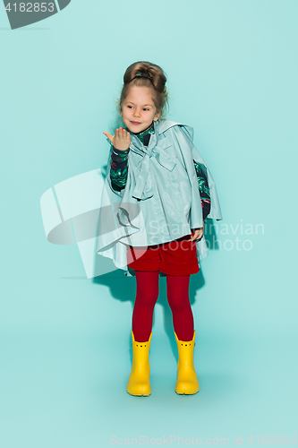 Image of Little girl posing in fashion style wearing autumn clothing.