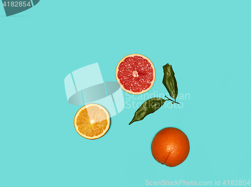 Image of The group fresh fruits against blue background