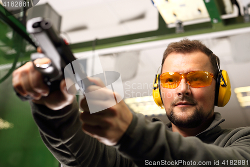 Image of Sport shooting range. The man at the shooting range.