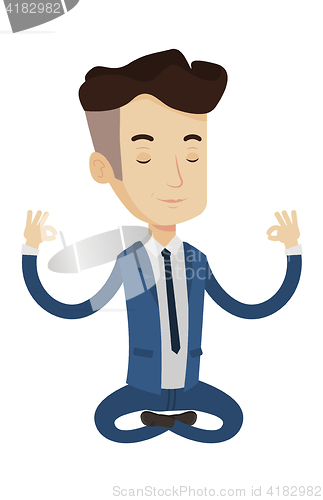 Image of Businessman meditating in lotus position.