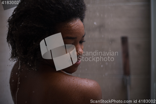 Image of African American woman in the shower