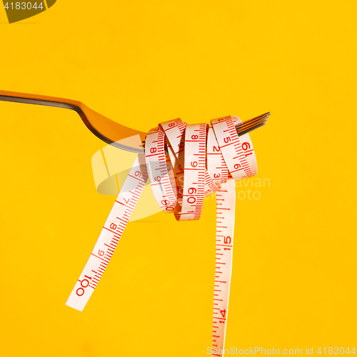 Image of Fork with measuring tape