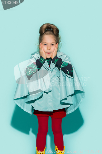 Image of Little girl posing in fashion style wearing autumn clothing.