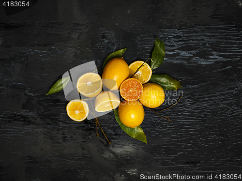 Image of The fresh lemons on black background