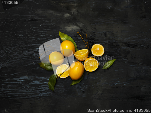 Image of The fresh lemons on black background