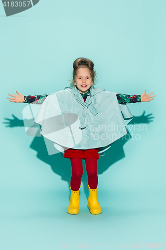 Image of Little girl posing in fashion style wearing autumn clothing.