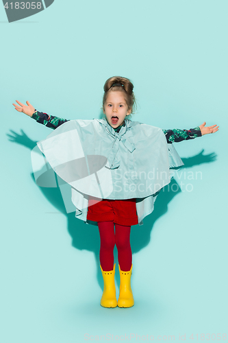 Image of Little girl posing in fashion style wearing autumn clothing.