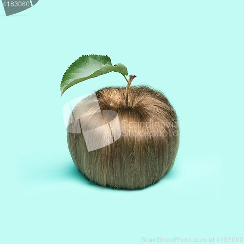 Image of The women\'s hair in the form of an apple