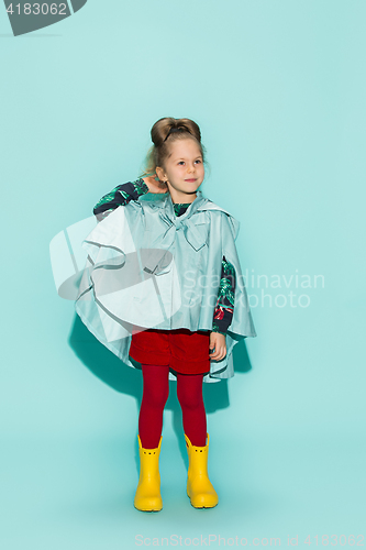 Image of Little girl posing in fashion style wearing autumn clothing.