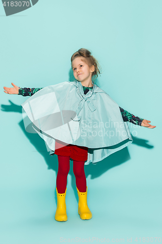 Image of Little girl posing in fashion style wearing autumn clothing.