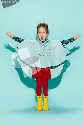 Image of Little girl posing in fashion style wearing autumn clothing.