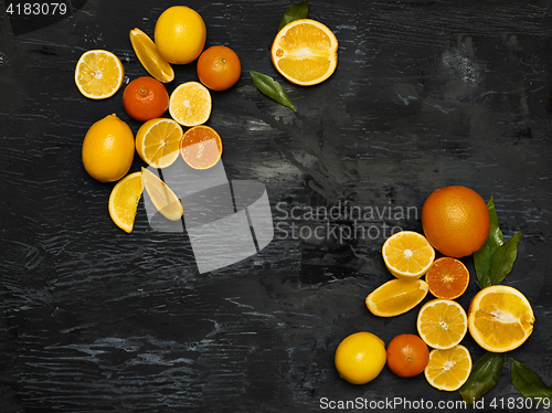 Image of The group fresh fruits against black background