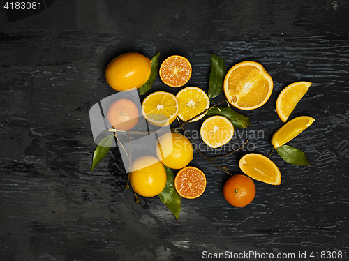 Image of The group fresh fruits against black background