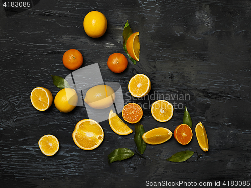 Image of The group fresh fruits against black background