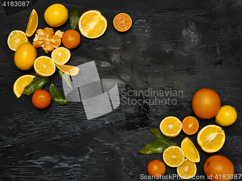 Image of The group fresh fruits against black background
