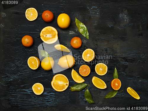 Image of The group fresh fruits against black background