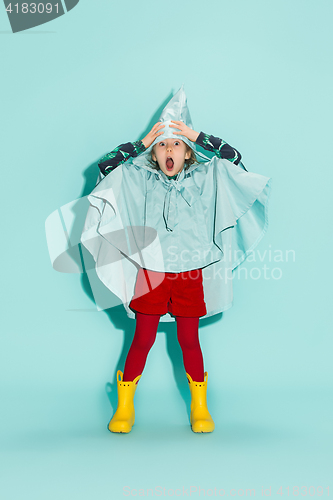 Image of Little girl posing in fashion style wearing autumn clothing.