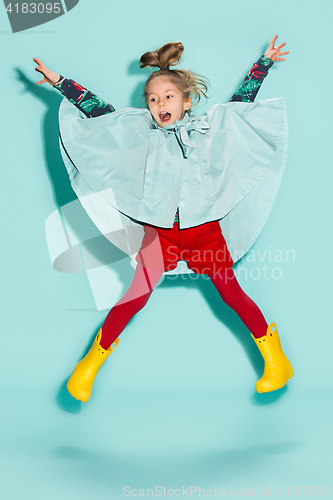 Image of Little girl posing in fashion style wearing autumn clothing.