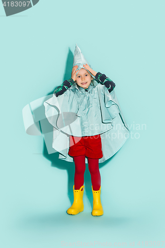 Image of Little girl posing in fashion style wearing autumn clothing.