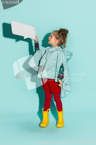 Image of Little girl posing in fashion style wearing autumn clothing.