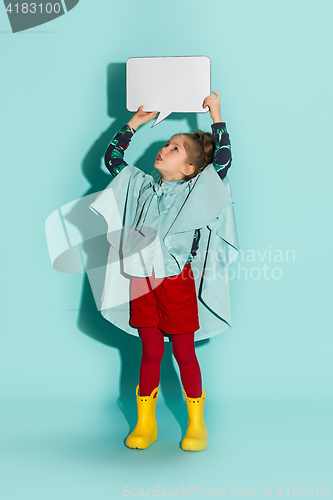 Image of Little girl posing in fashion style wearing autumn clothing.