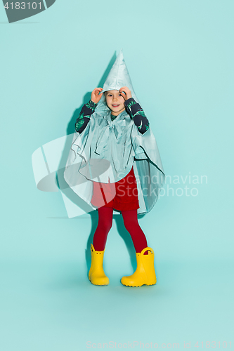 Image of Little girl posing in fashion style wearing autumn clothing.