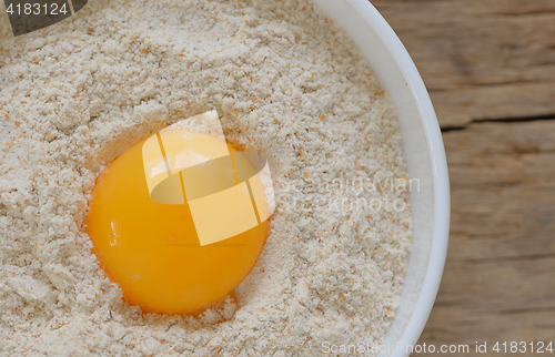 Image of Flour and egg ready for mixing