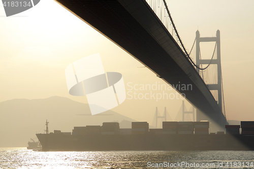 Image of long bridge in sunset hour